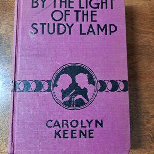 1934 1st edition Nancy Drew novel, By the Light of the Study Lamp.